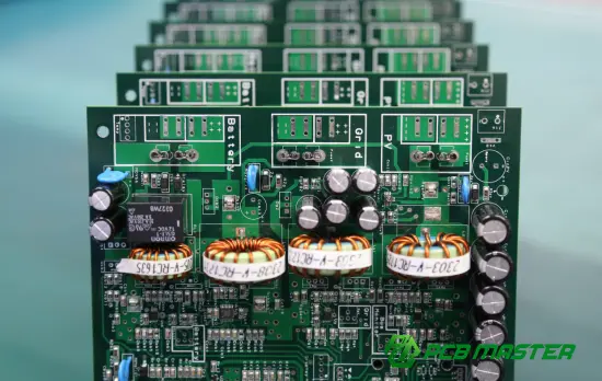 Surface mount capacitor PCB assembly with multiple printed circuit boards