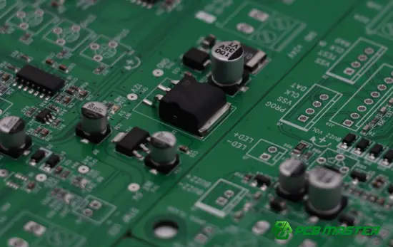 PCB with electronic components and capacitors for circuit filtering and power management